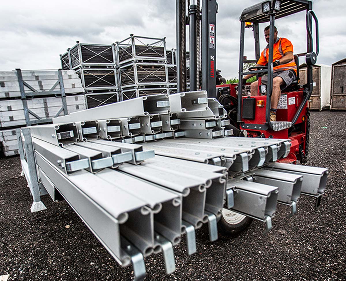 Forklift lifting marquee structure