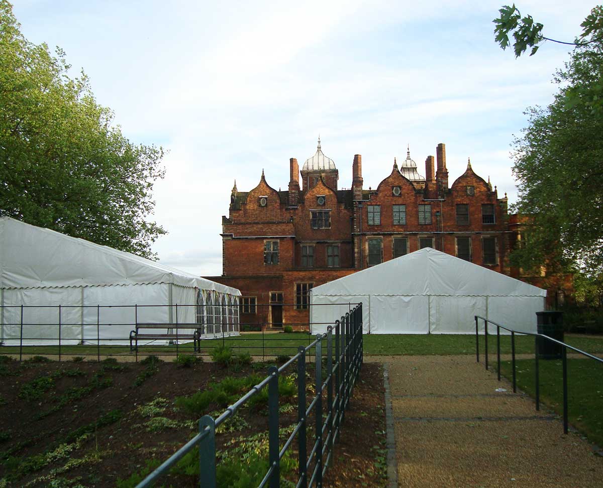 Large marquee in the grounds of a manor house