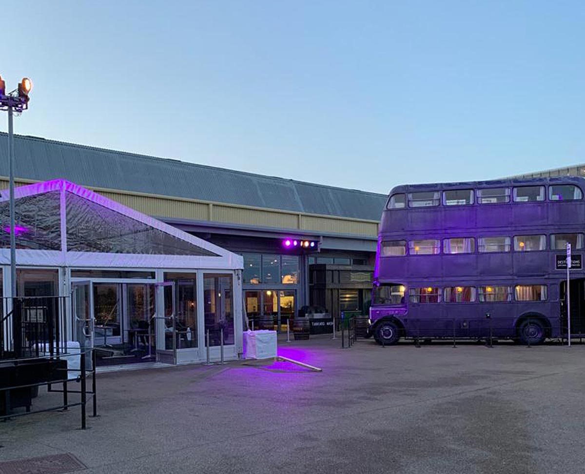 Purple bus outside Warner Bros studios